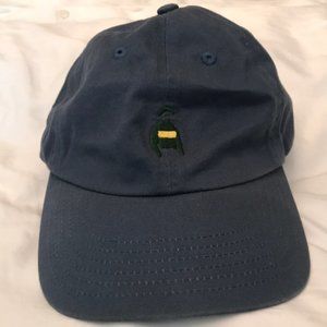 Soft blue hat with a jockey on the front.